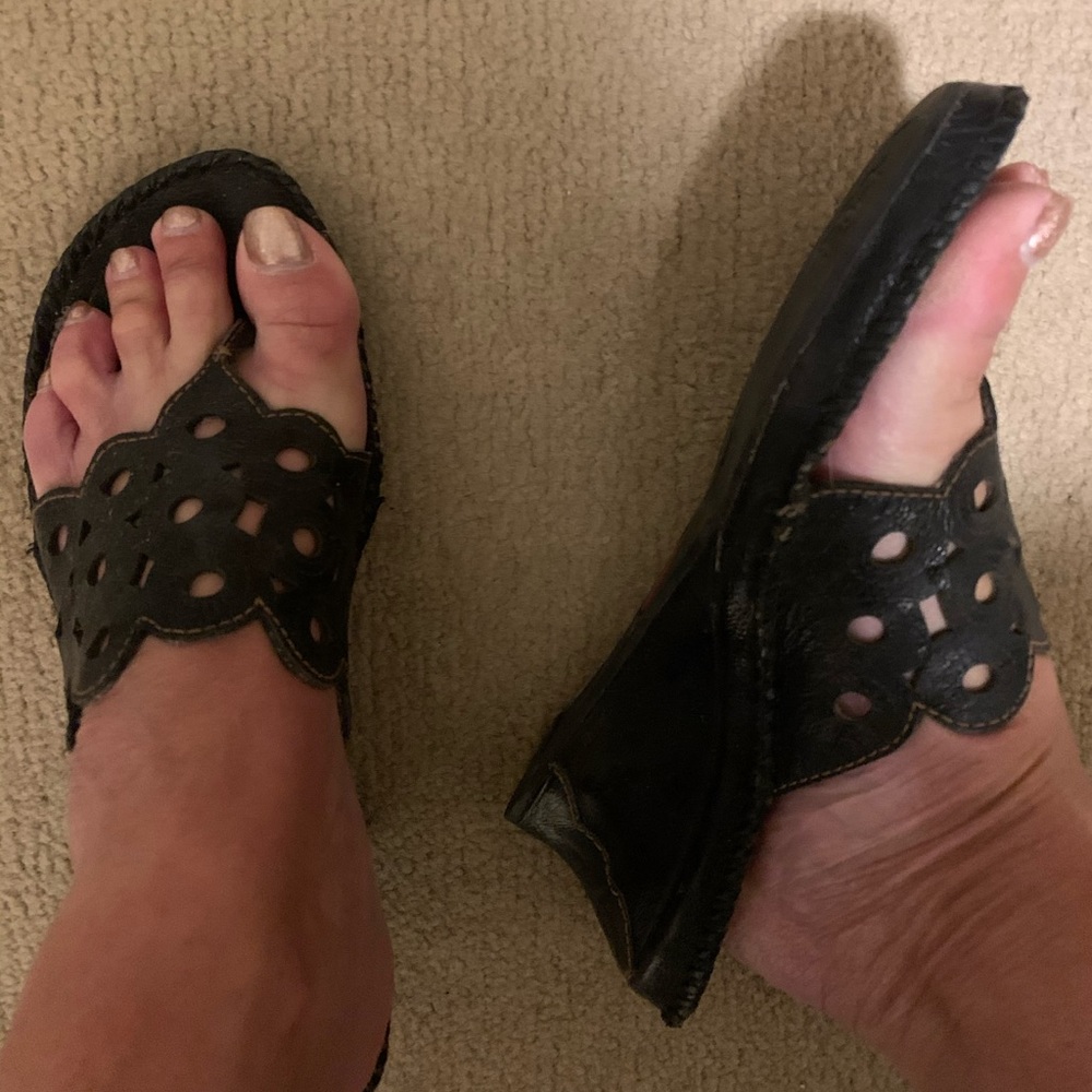 - Black Clark’s Artisan sandals